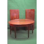 Mahogany D end dining table having two extra leaves and supported on eight square moulded tapering