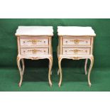 Pair of painted bedside cabinets having shaped top,