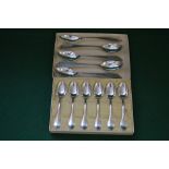 Set of five antique silver grapefruit spoons with bright cut decoration,