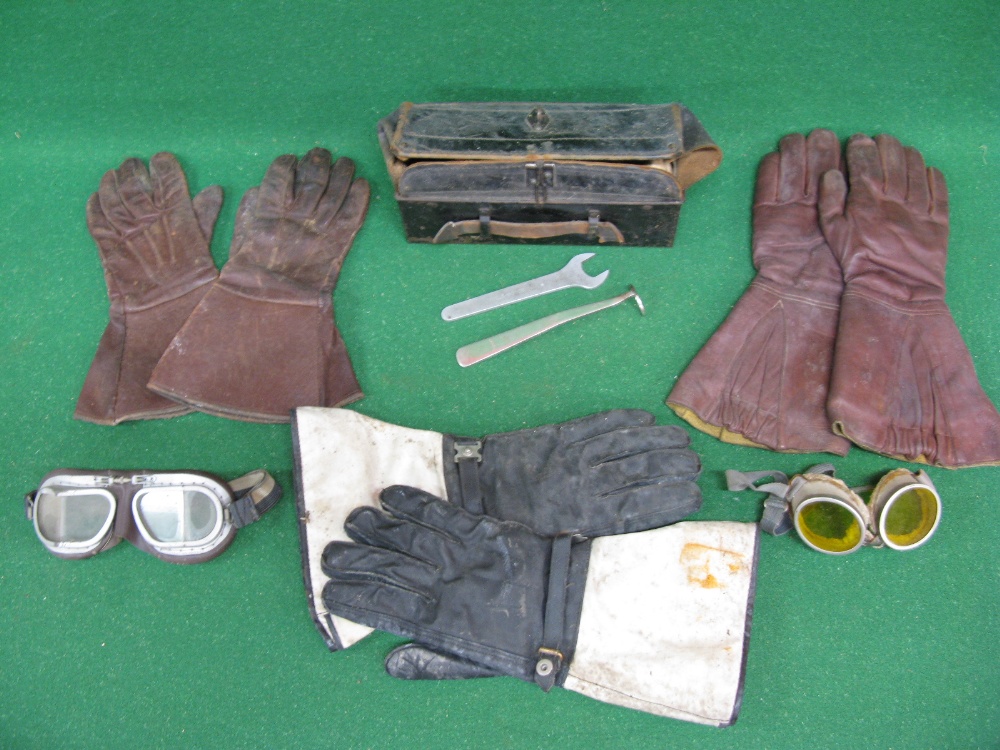Three pairs of leather gauntlets,