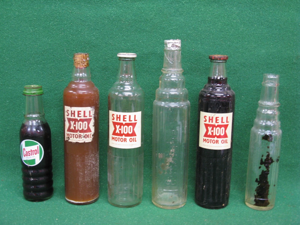 Six oil bottles for Shell, Essolube and Castrol,