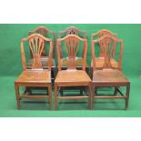 Group of twelve Georgian oak dining chairs having pierced back splats and arched tops,