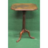 Rectangular mahogany occasional table having cut corner top supported on carved and reeded column