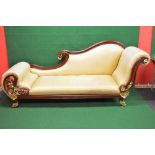 20th century mahogany framed chaise longue with gold coloured upholstery having scrolled mahogany