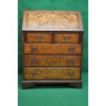 Late 20th century walnut bureau having fall front opening to reveal fitted interior of pigeon holes