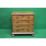 19th century walnut chest of drawers the top having moulded edge over four long graduated drawers