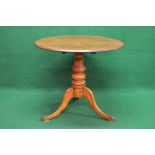 Mahogany tip top occasional table having circular top supported on turned column leading to three