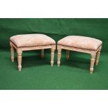 Pair of limed beech framed foot stools having floral tapestry tops,