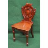 Victorian mahogany hall chair having shield shaped back with central pierced decoration and