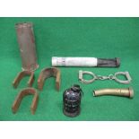 3" shell case marked 15, training hand grenade marked 9/40, hand cuffs, three large magnets,