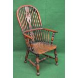 Oak Windsor chair having pierced back splats and spindles over solid seat,