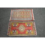 Red ground rug with black, white and yellow pattern - 36" x 19.