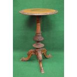 Victorian walnut tripod occasional table the top having carved border,