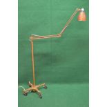 Herbert Terry floor standing anglepoise lamp on a quad form base with castors,