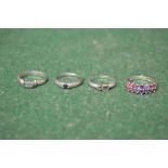 Group of four 925 silver ladies rings set with iolote,