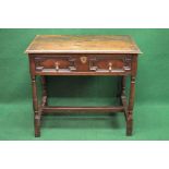 Oak single drawer side table having brass drop handles,