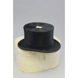 A boxed Henry Heath silk top hat