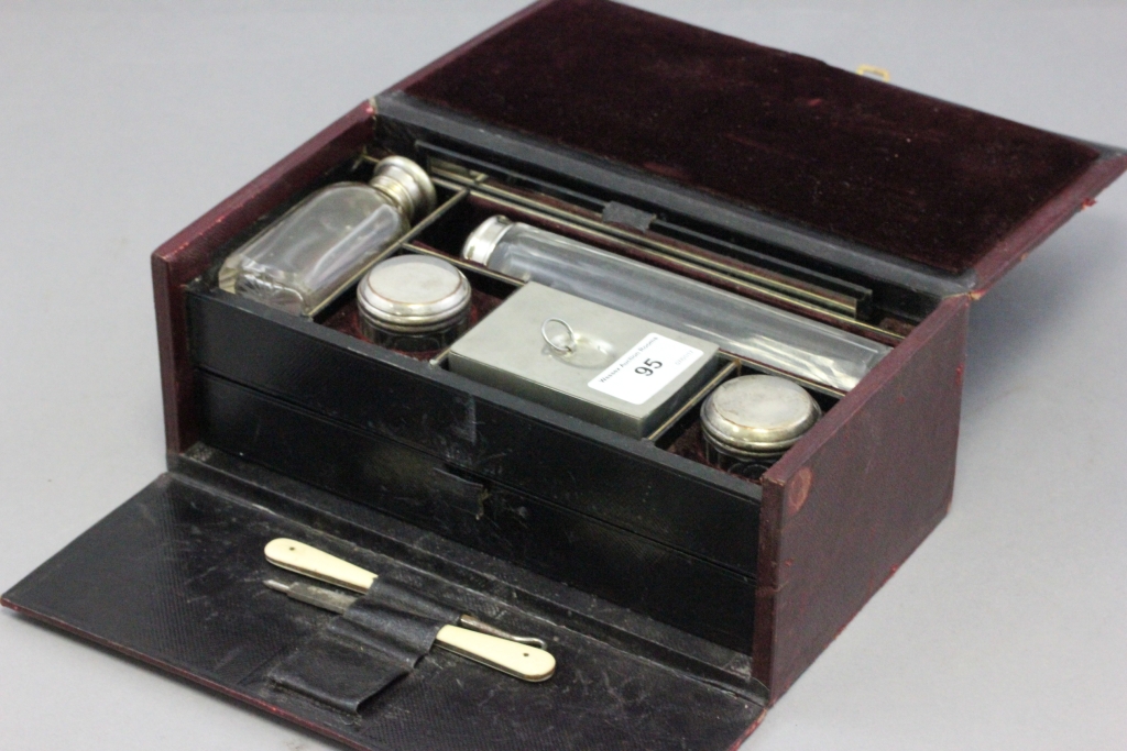 Victorian Tooled Leather Vanity Case fitted with Glass Bottles and Manicure Items