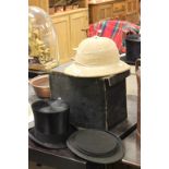Old pith helmet and boxed top hat with additional folding top hat