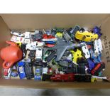 A collection of toy cars, including some Corgi etc