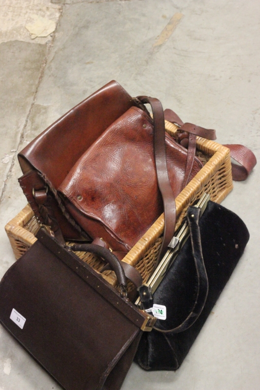 A collection of vintage leather hand and shoulder bags