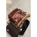 A collection of vintage leather hand and shoulder bags