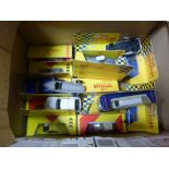 A collection of boxed Shell cars, along with various other model cars