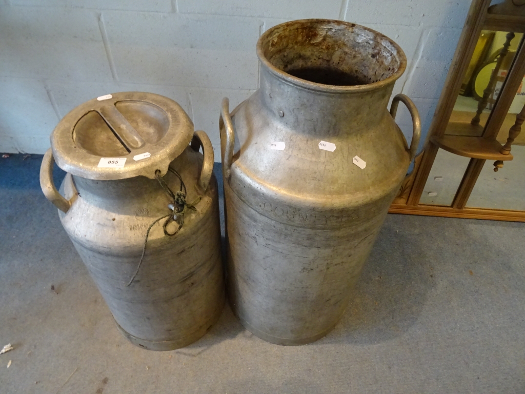 Two vintage aluminium milk churns