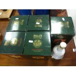 Six vintage bottles of Bells whisky with contents, five with original packaging