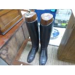 Pair of hunting boots with trees