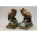 Pair of bookends in the form of owls stood on books