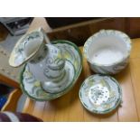 A four piece Royal Doulton wash set, each piece decorated with stylised flowers