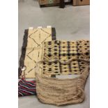 Two Bilum bags from Papa New Guinea, along with two South African textiles