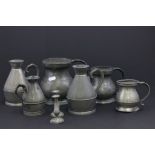 Three Pewter Measures, Three Pewter Tankards and Pair of Pewter Candlesticks