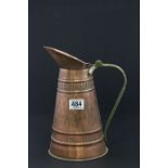 Copper and brass tapering jug with hammered finish