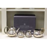 A four piece silver plate tea service by Mappin & Webb, in original box