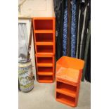 Three Kartell Orange Plastic Modular Three Tier Units (one section a/f) designed by Anna Castelli