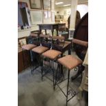 Set of Four Wrought Iron Bar Stools with padded backs and seats