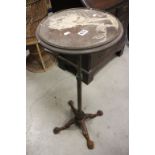 Late 19th / Early 20th century Circular Table on adjustable cast iron case