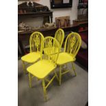 Four Yellow Painted Wheelback Kitchen Chairs