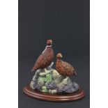 A Border Fine Arts model of male and female pheasant, "Moorland Alert", a/f