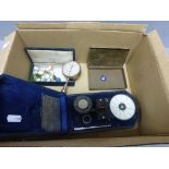 Box of mixed items to include Smiths meters, cigarette tin