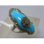 A silver marcasite and turquoise art deco style ring