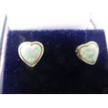 A pair of silver and opal heart shape earrings