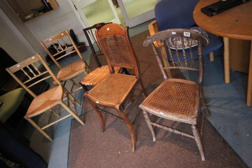 Three String Seated Chairs and Two Wicker Seated Chairs