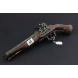 A reproduction flintlock pistol