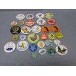 A collection of vintage badges