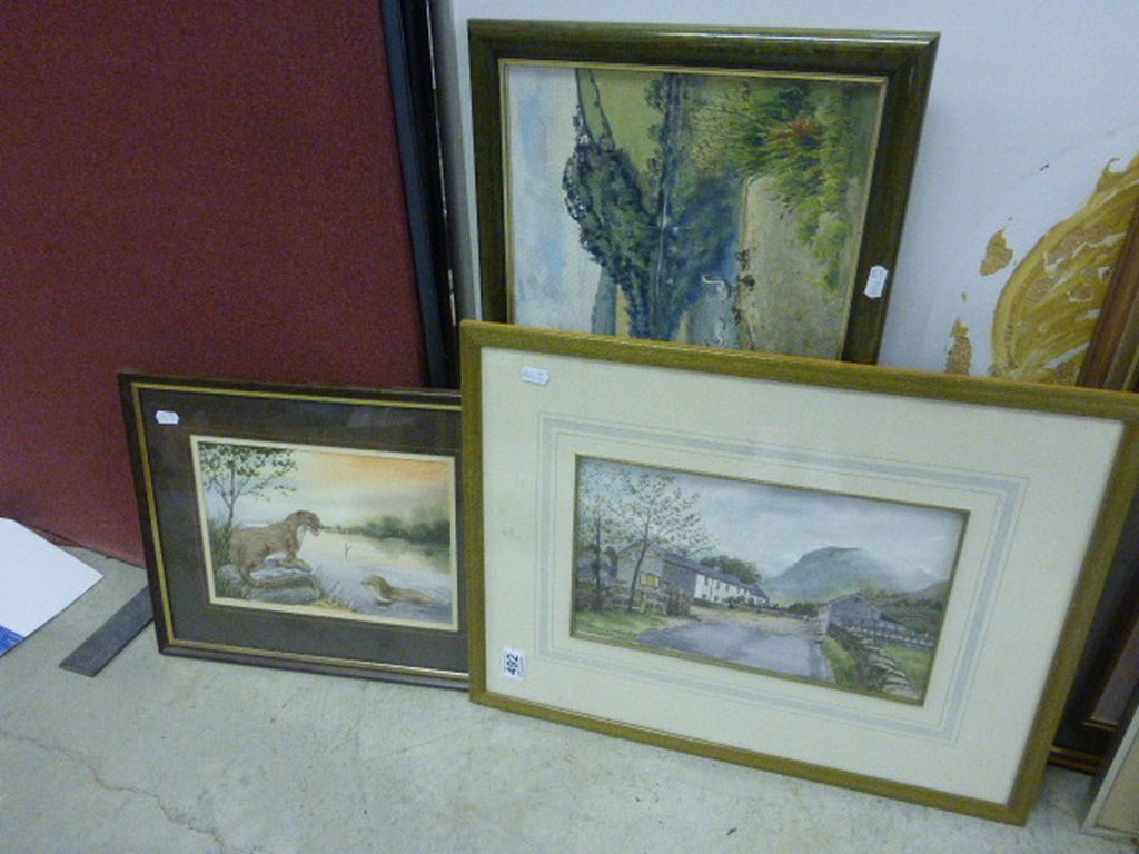 Framed & glazed watercolour of Otters and a framed and glazed watercolour of Highland Village scene,