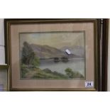 Gilt framed watercolour of a lake signed A H Milain