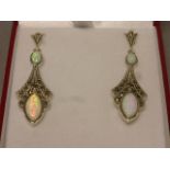 A pair of silver marcasite and opal set drop earrings